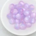 Close-up detail of dreamy jelly purple cat eye beads, perfect for DIY jewelry and bracelets. - 5. Dreamy Light Purple