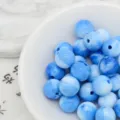 Blue marble acrylic beads detail showing smooth glossy surface for DIY jewelry making. - 5. Porcelain Blue