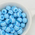 Blue white striped resin beads close up, perfect for DIY handmade jewelry and phone charm making. - Blue