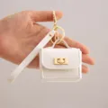 Llavero de mini bolso de piel sintética blanca estuche de auriculares accesorio portátil lindo. - Blanco