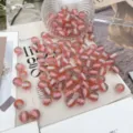 Pink glitter resin beads detail shot, gradient starry round loose beads for DIY jewelry making. - Watermelon red