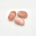 Detail shot of irregular swirled acrylic beads, pink imitation stone for DIY jewelry making accessories. - Rose