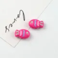 Close-up of pink acrylic fish shaped beads with colorful details for DIY jewelry crafting. - 21.7*14mm / Rose Red