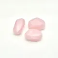 Close-up detail of irregular pink acrylic beads, perfect for DIY jewelry making accessories. - Lotus Pink