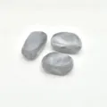 Detail shot of grey marbled irregular acrylic beads, perfect for DIY jewelry and crafts. - Gray