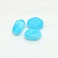 Detailed view of light blue irregular marbled acrylic beads for handmade jewelry DIY craft projects. - Lake Blue