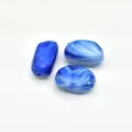 Blue marbled irregular acrylic beads detail shot, perfect for DIY handmade jewelry and charms. - Sapphire Blue