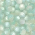 Close-up detail of light blue pearlescent resin cat-eye beads for DIY jewelry making. - Sky Blue