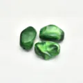 Green swirled acrylic irregular loose bead detail shot for DIY handmade crafting. - Verdant