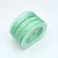 Close-up detail of mint green nylon braiding cord spool, ideal for DIY handmade bracelets and jewelry. - 0.8mm (Approx. 10m) / Aqua Green