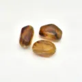 Close up view of irregular marbled acrylic beads for DIY handmade jewelry accessories - Smoky Quartz