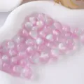Close-up detail of pink glitter resin round beads, perfect for DIY handmade jewelry crafts. - Size 6
