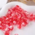 Red glitter resin round beads close up detail shot for DIY jewelry making accessories - Size 8