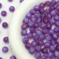 Purple starry mermaid resin round beads detail shot, perfect for DIY jewelry projects. - Deep purple