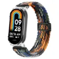 Gros plan détaillé du bracelet de rechange en nylon tressé et de la coque transparente pour tracker. - Universel pour Xiaomi Band 3/4/5/6 / Camouflage Coloré - Coque Transparente