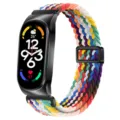 Vista dettagliata del cinturino smartwatch in nylon intrecciato colorato con chiusura magnetica. - Xiaomi Mi Band 3/4 / Arcobaleno ufficiale - cassa nera