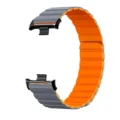 Zweifarbiges magnetisches Silikon-Ersatzarmband für Smartwatch, bequemes und stylisches Design. - Schwarz + Grau/Orange