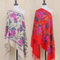 Detailed view of ethnic style embroidered cashmere-feel shawl with vibrant floral pattern. - 38