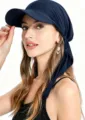 Detail view of the navy blue sun visor turban hat, showing lightweight fabric and curved brim. - One Size / Dark Blue
