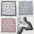 Detalle de pañuelo cuadrado de seda, diseño de estampado floral elegante, bordes finos. - RY-35