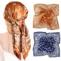 Detail view of a 90cm satin paisley square scarf showing vintage print and smooth texture. - Style 013