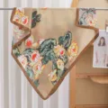 Detail shot of Chinese style lotus floral print silk square scarf, elegant beige scarf edge. - Lotus on Coffee Ground RY-53