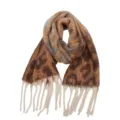 Detail view of retro leopard print winter tassel scarf closeup fabric texture accessory. - Leopard Print Brown & Coffee