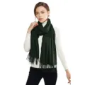 Detailed view of the soft dark green cashmere-feel scarf texture and elegant fringe design. - Dark Green (015)