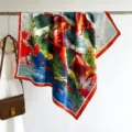 Detailed close-up view of the luxury silk square scarf with vibrant abstract floral art print. - RY-14