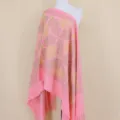 Pink cashmere feel shawl detail, gold floral embroidery pattern and delicate tassels edge view. - Rose