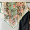 Exquisite floral print and intricate rope border detail on a elegant green silk square scarf. - Woven Flower-Emerald Green