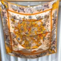 Silk square scarf featuring elegant equestrian carriage print and vibrant orange tones. - Vintage Elegance RY-38