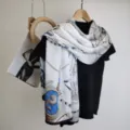 Elegant white silk scarf with nautical rope and ship print, luxury fashion accessory. - Nautical Theme