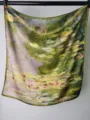 Detailed view of the 53cm square oil painting silk scarf featuring artistic floral print. - Monet Green Water Lilies