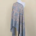 Silver grey cashmere feel shawl detail, elegant embroidered totem design, cozy winter accessory. - Graphite
