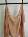 Detail shot of solid color chiffon shawl hanging cleanly, lightweight and breathable fabric. - Bronze