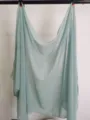 Detailed view of a solid color light green chiffon scarf, lightweight and elegant for daily wear. - Light Green