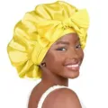Details of yellow satin sleep bonnet with bow, double layer hair care cap for women close up. - 58cm Head Circumference (One Size) / Yellow