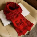 Red winter festive scarf featuring classic carriage pattern and traditional elegant tassel fringe. - Carriage of Fortune