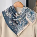 Detailed view of the vintage blue and beige paisley printed cotton linen square scarf. - RY-15
