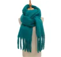 Detailed view of women winter solid color fringe scarf, cozy loop yarn texture, teal color. - Dark Green