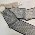 Silk twilly scarf with paisley pattern and wooden ring. Elegant silk ribbon for women's styling. - Gilded Paisley