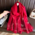 Red faux silk scarf with pearl rhinestone flower details, lightweight and elegant accessory. - 74.8*27.5inch / Burgundy