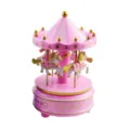 Close-up detail of the pink and white carousel music box with golden stars and cute miniature horses. - Pink Carousel Music Boxes