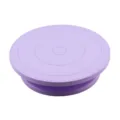 Purple plastic cake turntable rotating stand with non-slip base for baking and decorating. - Ordinary Turntable / Purple
