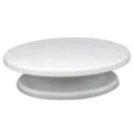 White plastic cake turntable rotating stand with non-slip edge for baking and cake decorating. - Ordinary Turntable / White