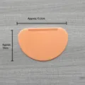 Plastic semi-circular baking dough scraper close-up view showing soft and flexible design. - Soft Scraper / Orange