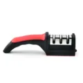 Handheld 3-stage kitchen knife sharpener tool with ergonomic red and black handle design. - Bag Packaging / Red