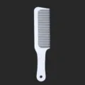 Professional white plastic hair comb with wave handle and hanging hole for salon styling. - White