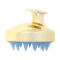 Goldene Kopfmassagebuerste mit blauen Silikonborsten, ergonomischer Griff zur Haarwaesche. - Gold